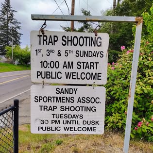 The roadside sign: Trap Shooting, 1st 3rd and 5th Sundays 10 AM start, Tuesdays until dusk, public welcome